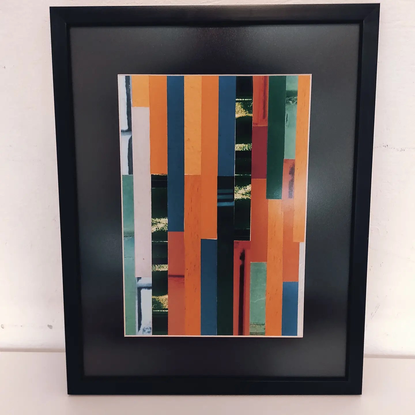 Quadro de colagem de papéis coloridos